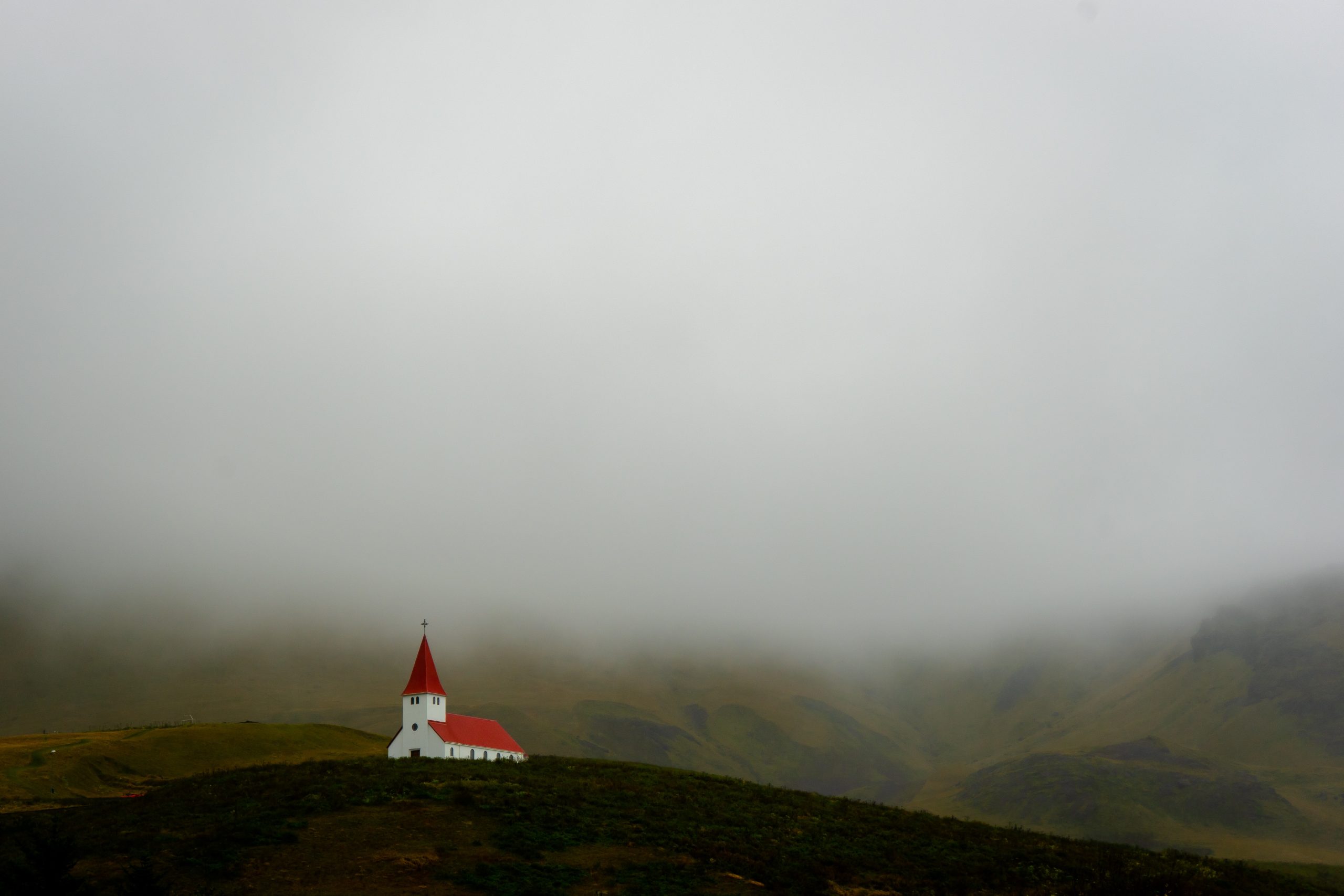 The church in Vik and low clouds in the background.
