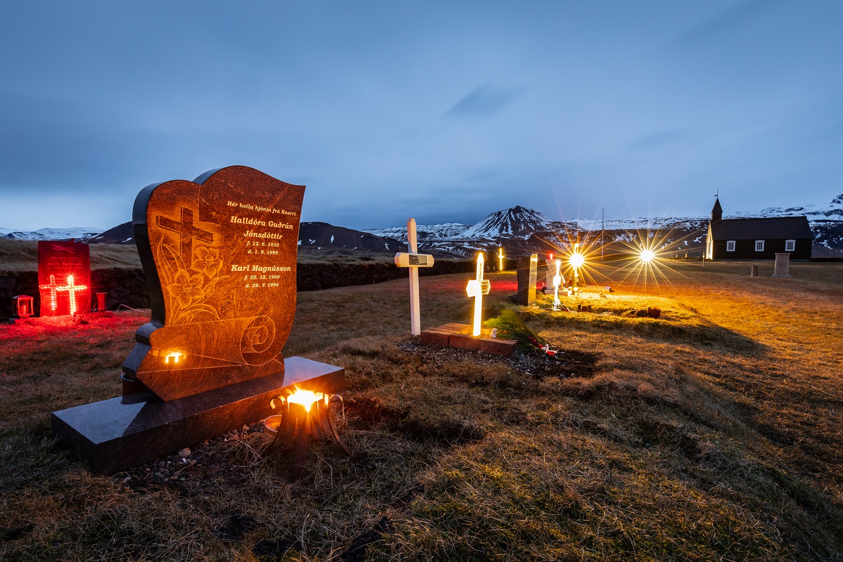 Icelandic Christmas tradition of decorating the cemetery with lights.