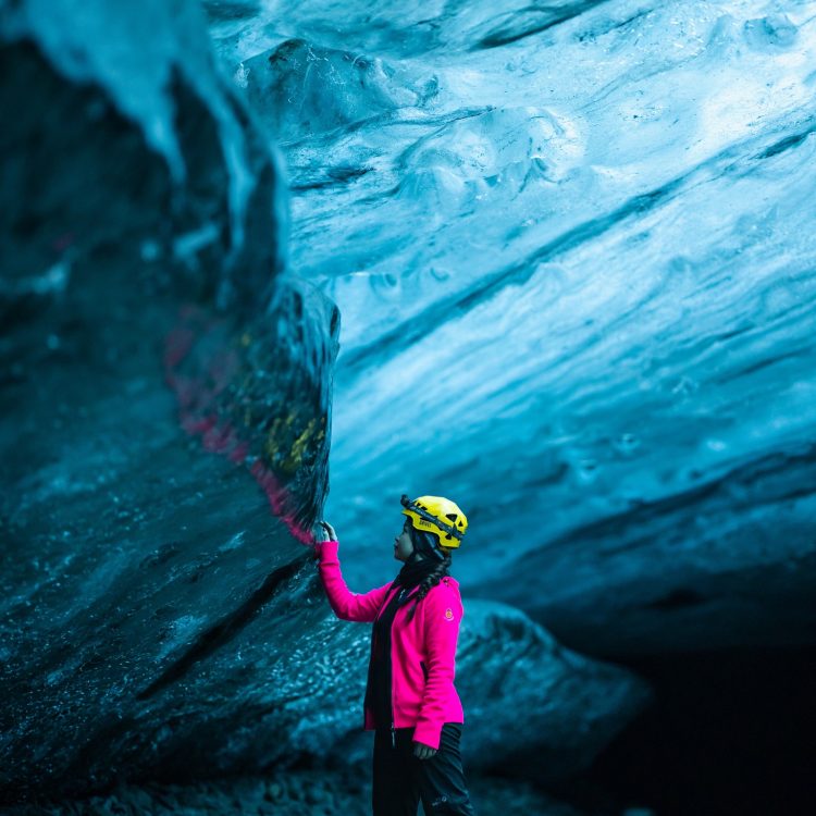 Ice Cave1 Touching the ice inside a Blue Ice Cave.